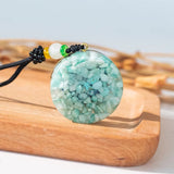 Orgonite Pendant "Protective Triskel" in Amazonite