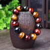 Crystal bead bracelets made with naturally colored tiger eye stones, suitable for both men and women