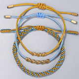 Celestial Weave: Tibetan Copper Bead & Rope Bracelets