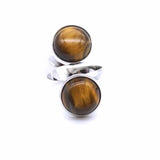 Double stone natural cabochon ring on white background.