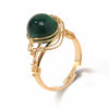 Adjustable semi-precious stone ring for women on a white background.