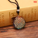 n9 orgonite pendant with om symbol variants 1