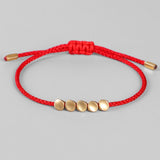 Buddhist Creative Artistic Irregular Copper Red Black Cord Pull Bracelet for Women.jpg 640x640