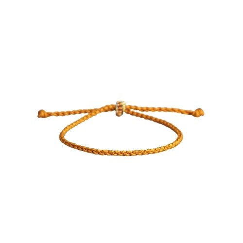 Tibetan macrame knot orange bracelet.