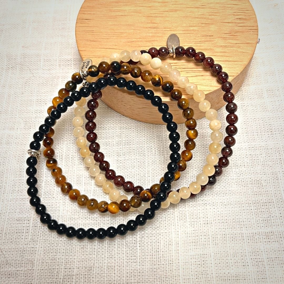 Ensemble "Success & Protection" in Garnet, Yellow Calcite, Obsidian & Tiger's Eye – Bild 3